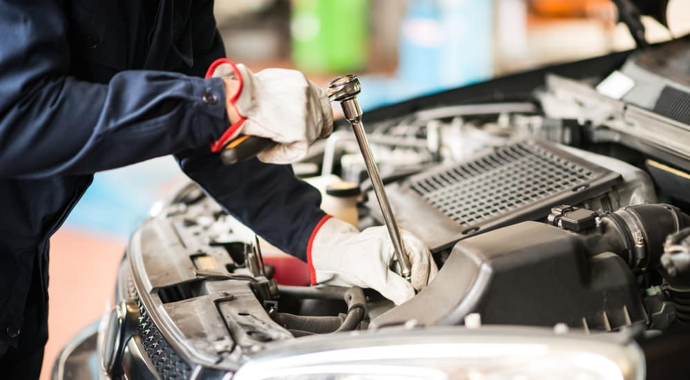 What does the Valvoline coupon for a synthetic oil change cost?